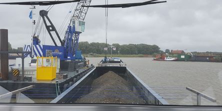 Lossen van bouwmaterialen e.d.